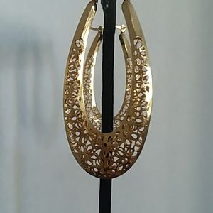 Signed SKL Gold tone oblong hoop earrings